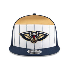 New Orleans Pelicans 2025 NBA Tip Off Split Panel 9FIFTY Snapback Hat White/Navy | New Era Near Me