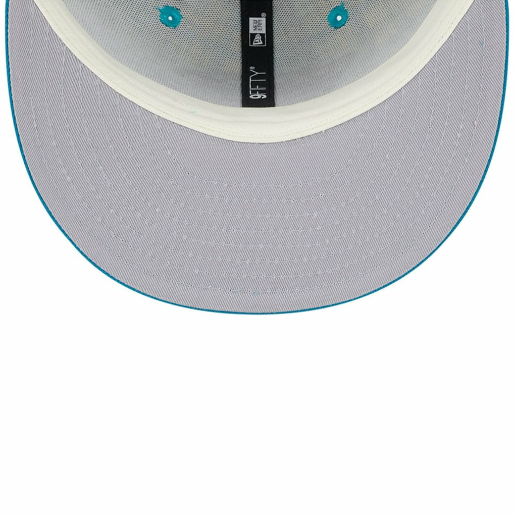 Jacksonville Jaguars New Era 2024 Sideline Statement 9FIFTY Snapback Hat Teal