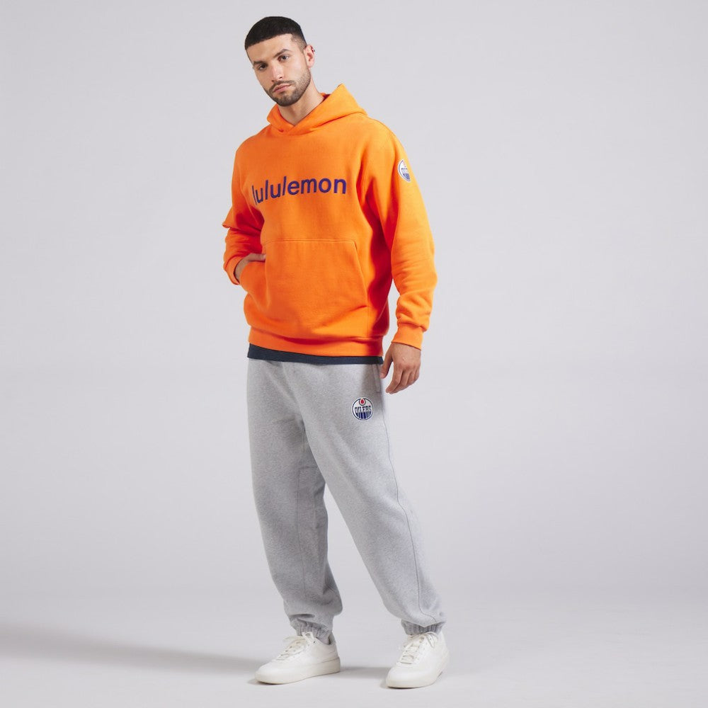 Edmonton Oilers lululemon Steady State Pullover Hoodie - Tiger - NHL 202151370