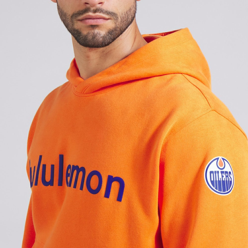 Edmonton Oilers lululemon Steady State Pullover Hoodie - Tiger - NHL 202151370