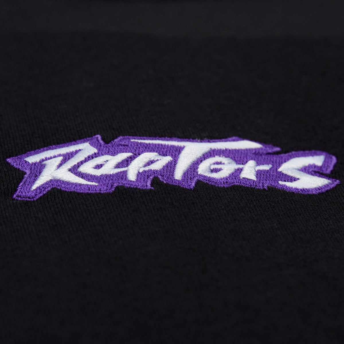 Toronto Raptors Unisex Playmaker Vintage Logo T-Shirt Black | Mitchell & Ness US