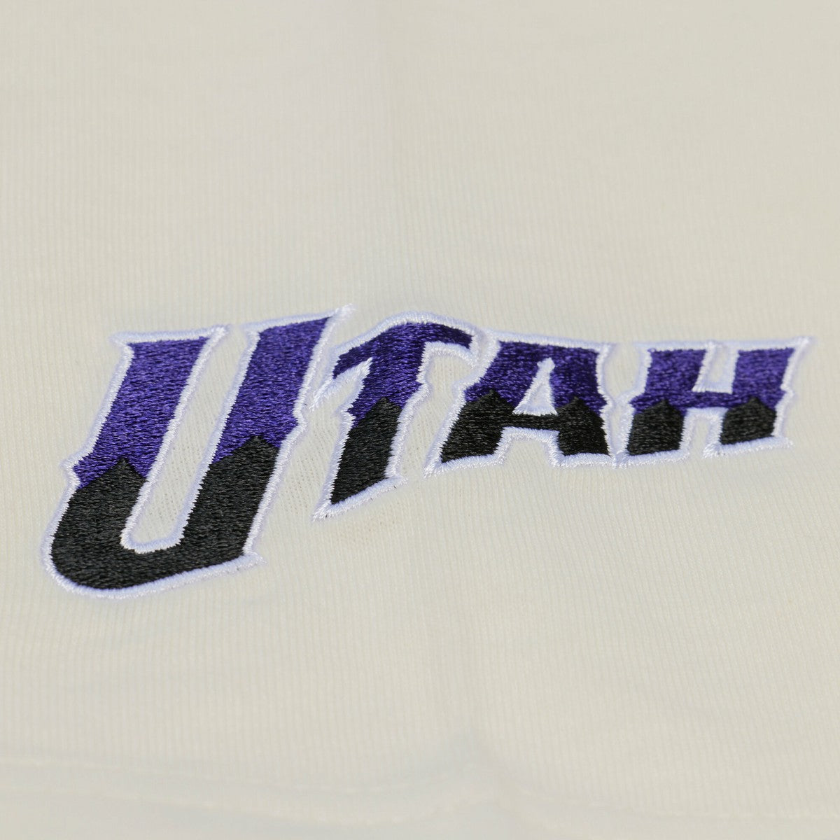 Utah Jazz Hardwood Classics Chainstitch Premium T-Shirt Cream | Mitchell & Ness online