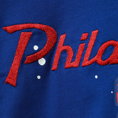 Philadelphia 76ers Women's Courtside Splatter Cropped T-Shirt Royal | Nike online