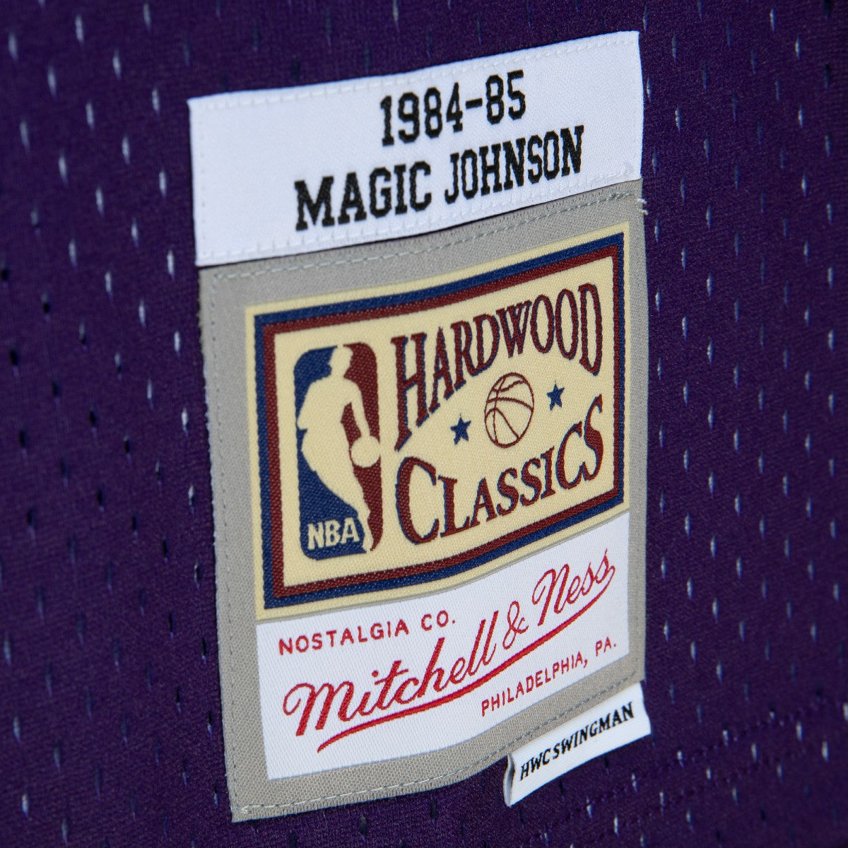 Magic Johnson Los Angeles Lakers 1984/85 Hardwood Classics Fadeaway Swingman Player Jersey Purple/Black | Mitchell & Ness US