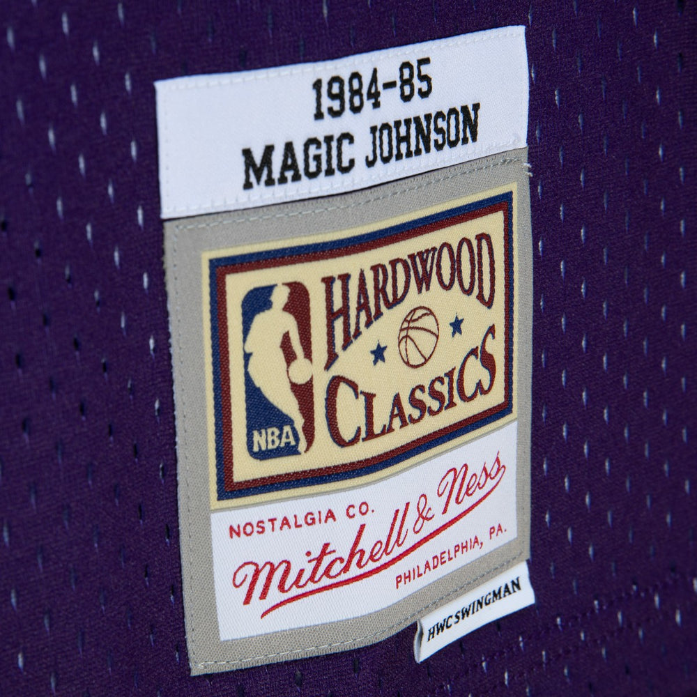 Magic Johnson Los Angeles Lakers 1984/85 Hardwood Classics Fadeaway Swingman Player Jersey Purple/Black | Mitchell & Ness US